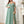 Load image into Gallery viewer, Belle Plus Size Chiffon Bridesmaid Dress With Shoulder Cut-Out, Pleated Front, Waist Belt, High Slit And Cami Straps (Mint Green)
